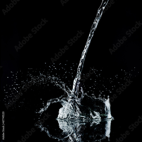 Water splash on black background. Hi-Res 1/8000 sec. Broncolor S