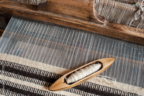 Hungarian traditional homespun. Traditional weaving hand-loom for carpets in Transylvania.