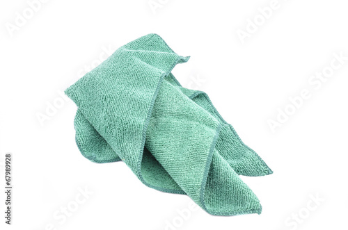 Crumpled green microfiber cloth isolated on white background