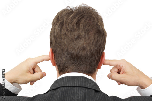 businessman blocking his ears with fingers . .deaf manager conce