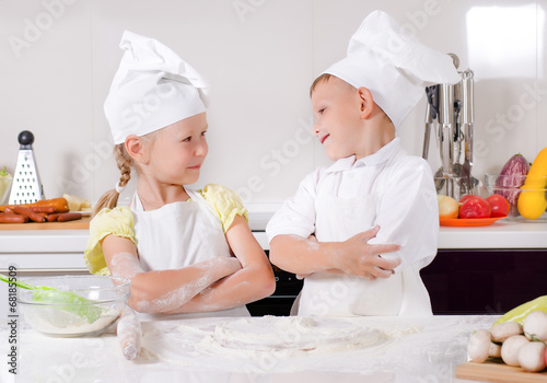 Supercilious little boy chef