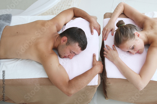 Young couple having spa procedure togerther