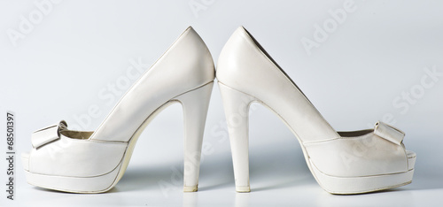Woman white shoes on white