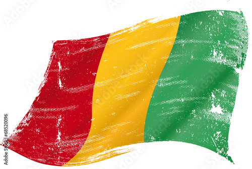 waving Guinean grunge flag
