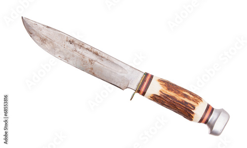 Very old bowie knife isolated