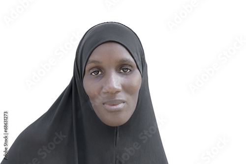 African woman wearing a black cotton veil, isolated