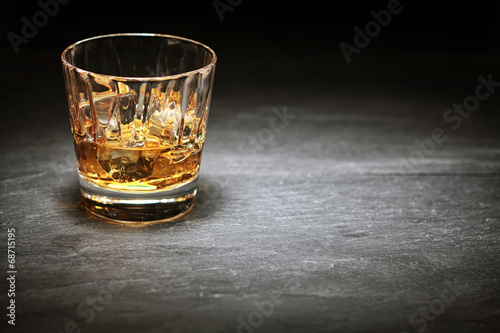 Whiskey on the rocks in a glass tumbler
