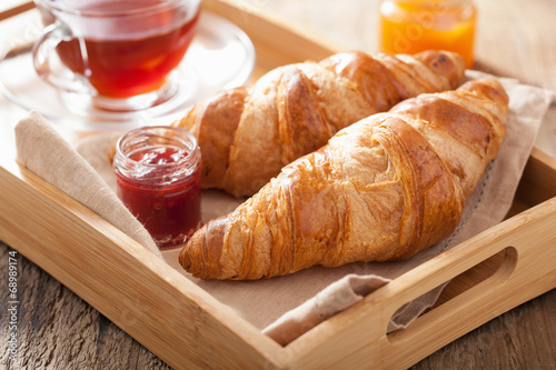 fresh croissants with jam for breakfast