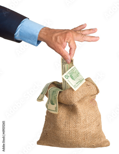 Hand pulls money out of the bag. isolated. eries of images.