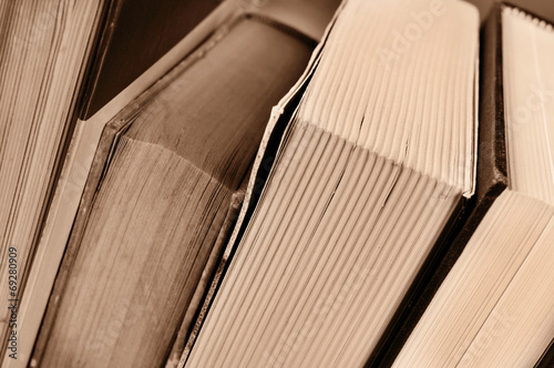 books, in sepia tone