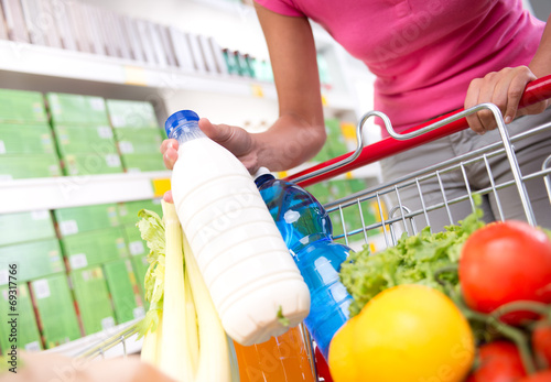 Full shopping cart at supermarket