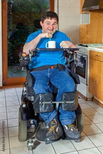 Young man with infantile cerebral palsy.