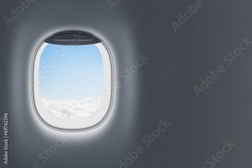 Airplane or jet window on wall with blank space