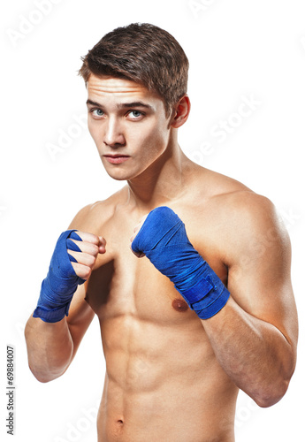 Young handsome male boxer fighter
