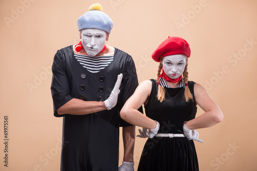 Couple of two funny mimes isolated on background