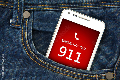 mobile phone in pocket with emergency number 911. focus on scree