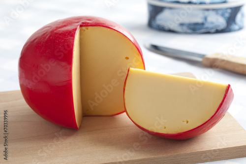Edam cheese on a cutting board