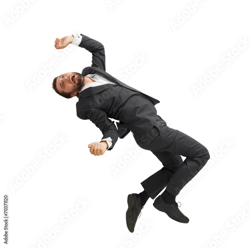 frightened businessman falling down