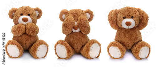 Three teddy bears on white background