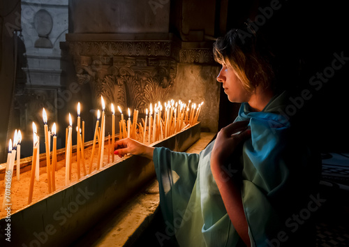 The pilgrims lit candles at the Church of the Holy Sepulchre in