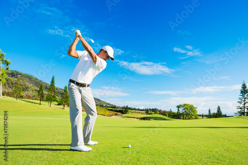 Man Playing Golf