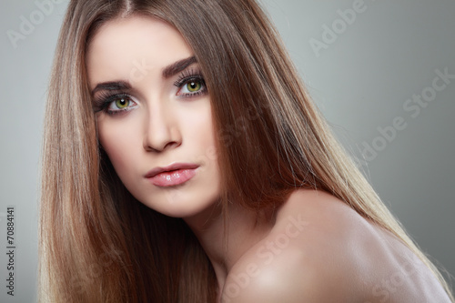 Beautiful girl, isolated on a light-grey background