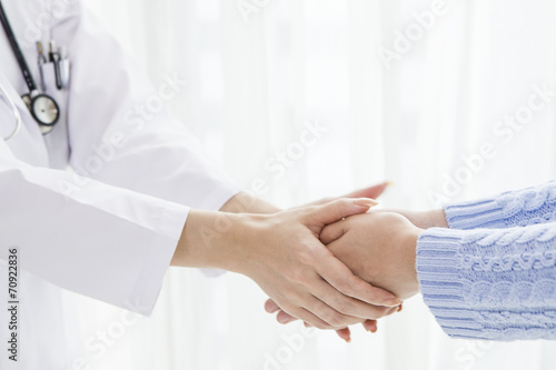 Doctor you are shaking hands with both hands