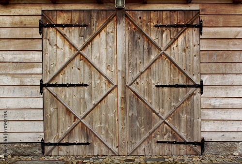 old barn wooden door with four crosses