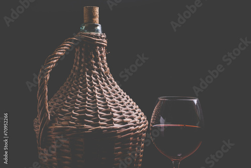 wine carboy and wine glass