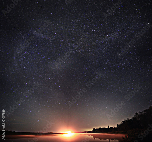 starry night sky lake landscape