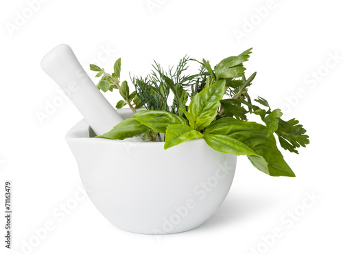 mortar with herbs isolated