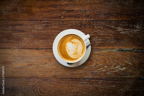 latte coffee on wood table.