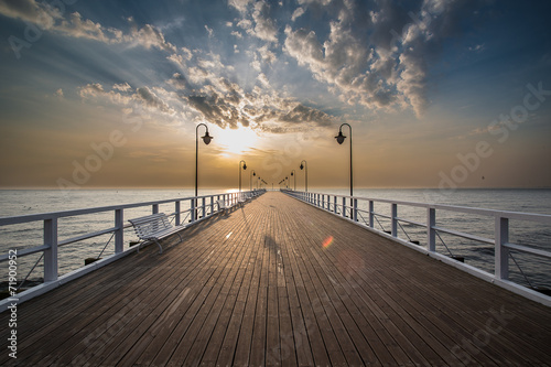 Sunrise on the pier at the seaside, Gdynia Orlowo, 