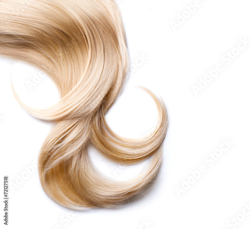 Blond hair isolated on white. Blonde lock closeup