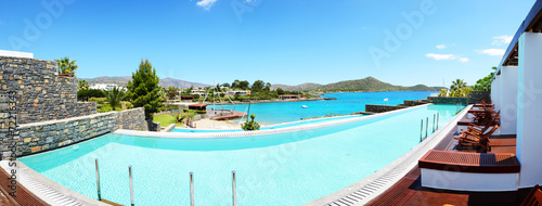 Panorama of swimming pool at luxury hotel, Crete, Greece