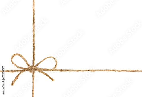 string or twine tied in a bow isolated on white background