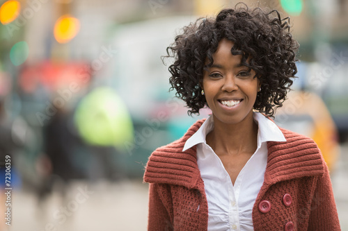 African American black woman in city smile happy face