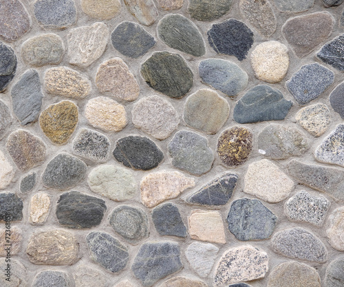 Old colorful stone wall closeup