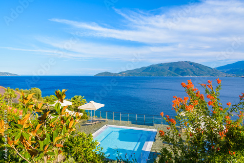 Swimming pool with sea and mountain view on Kefalonia island