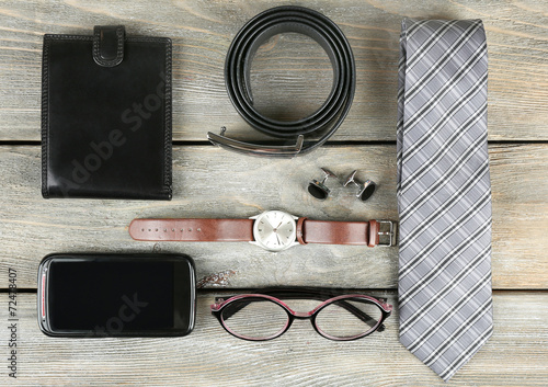 Essentials fashion man objects on wooden background