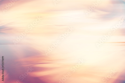 abstract warm yellow background motion blur