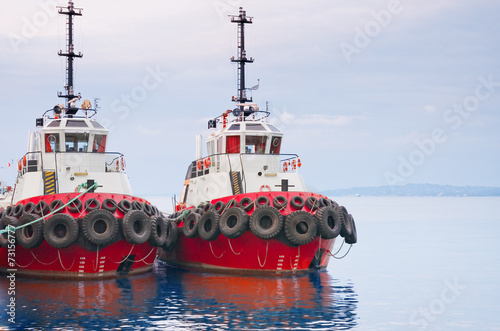 red tugboats