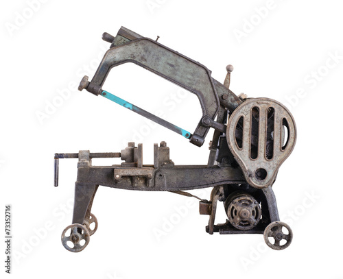 old dirty hacksaw machine industry tool. Isolated.