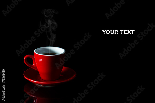 A cup of coffee on a black background