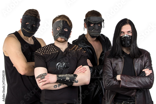 Portrait of the metal band in masks