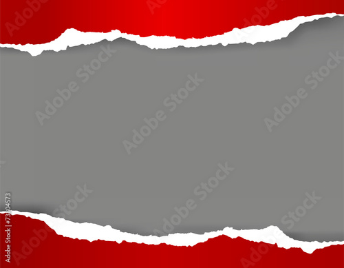 Bright red torn paper on grey background