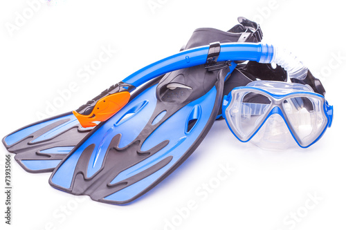 Blue diving goggles,snorkel and flippers. isolated