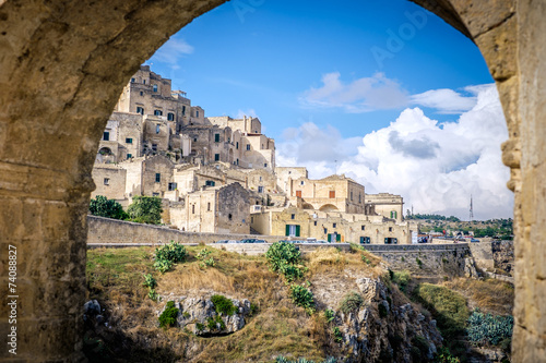 View of Matera through archway, Italy