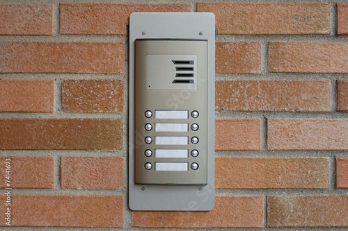 intercom on a brick wall