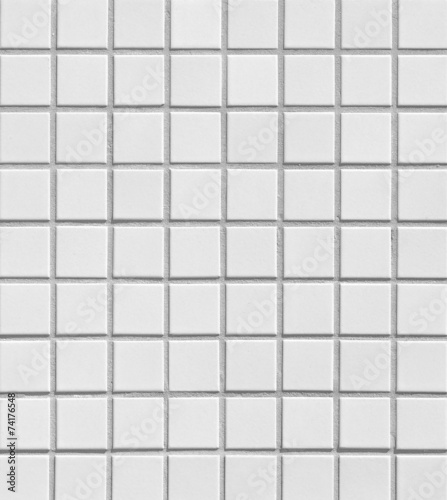 White mosaic tile wall seamless background and texture